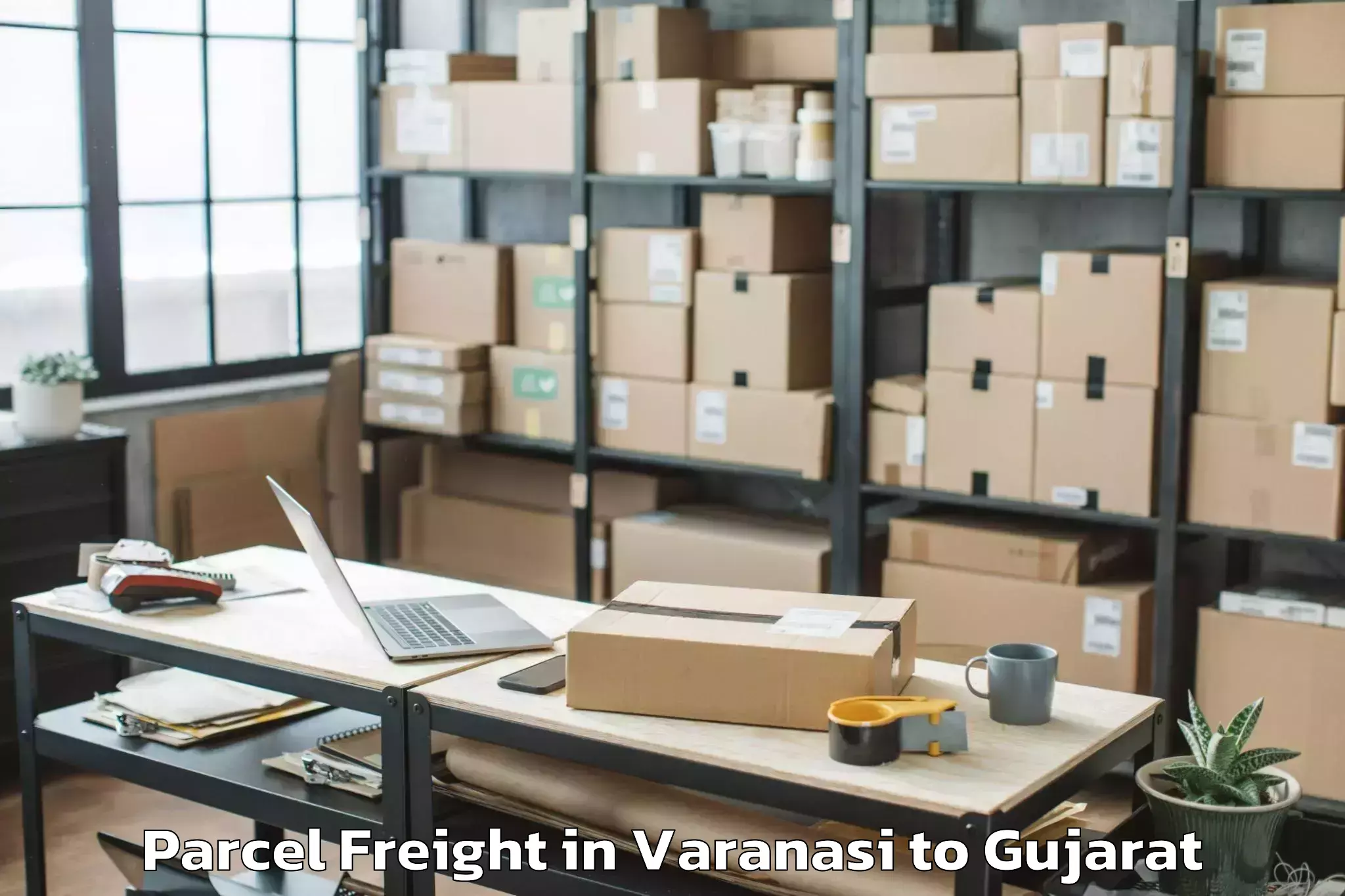 Varanasi to Sarkhej Parcel Freight Booking